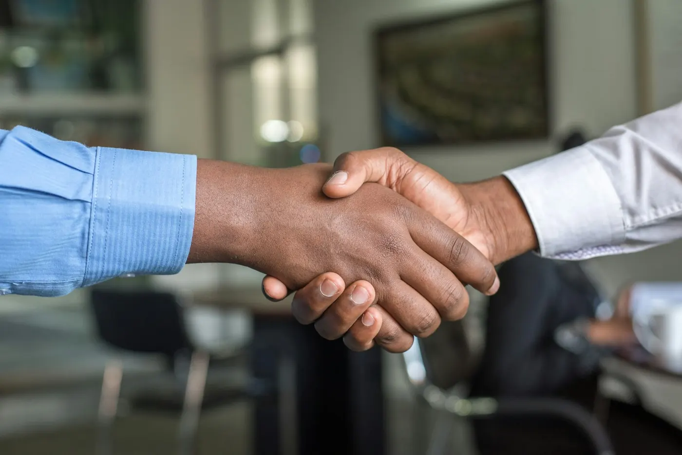 A handshake closing a deal