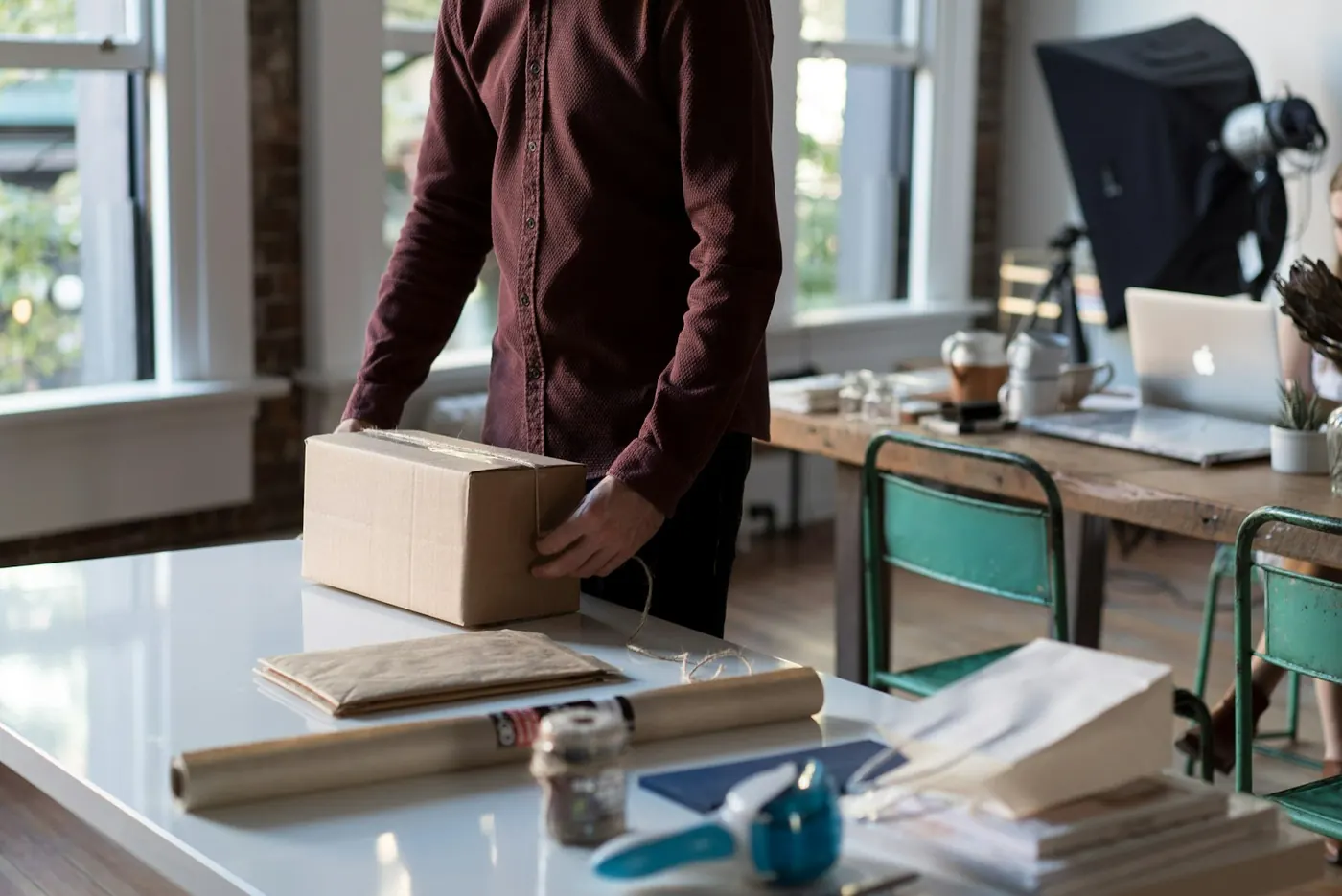 A parcel on a desk being prepared for shipping