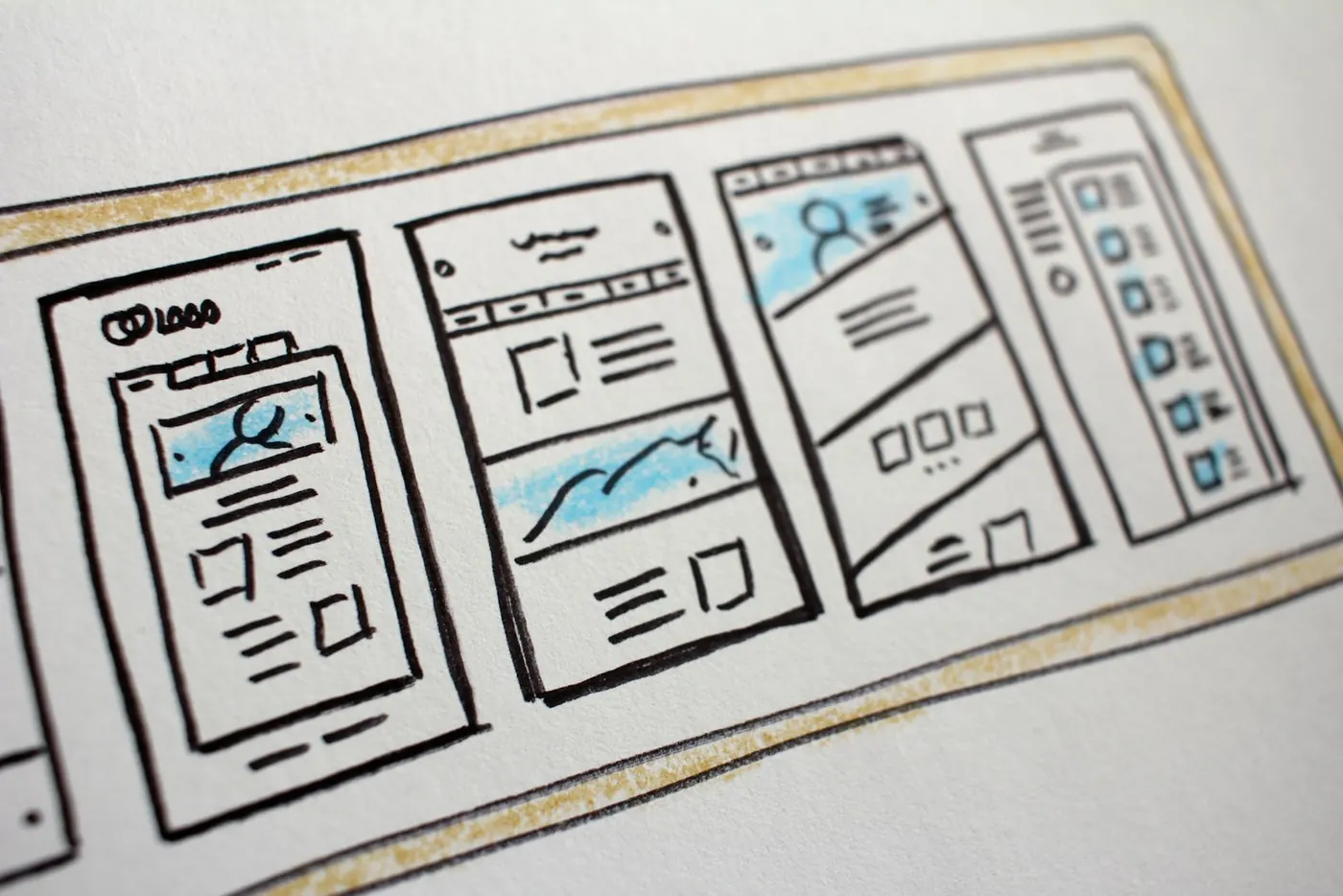 A website wireframe drawn on paper