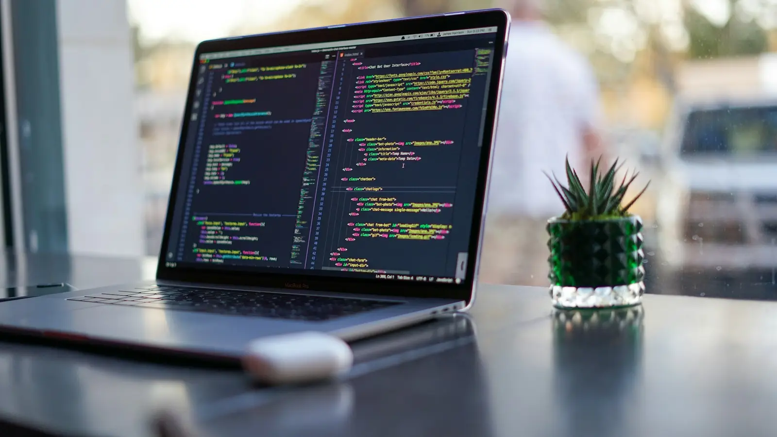 Laptop with code on a table