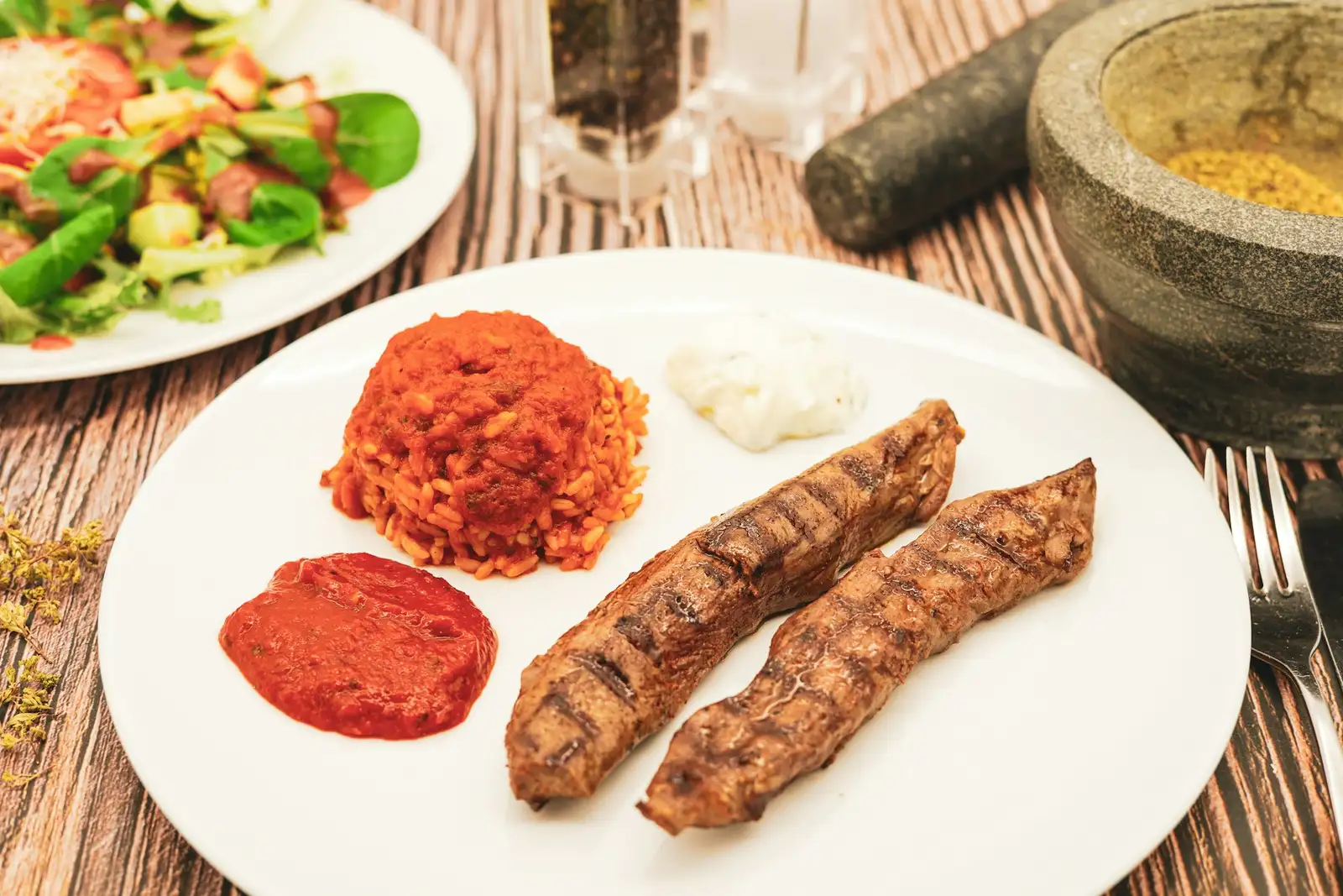 Grilled meat with red pepper relish